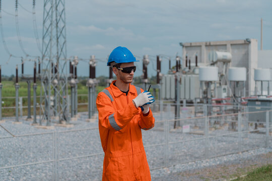 Electrical engineers are checking the operation and power distribution systems within the substation receiving power from the wind farm.	