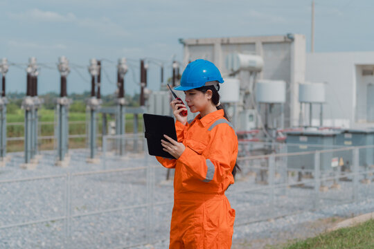 Electrical engineers are checking the operation and power distribution systems within the substation receiving power from the wind farm.	
