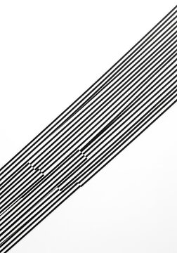 Minimalist graphic pattern featuring parallel diagonal black lines set against a clean white background, creating a rhythmic visual feel, uniform, simple, equidistant
