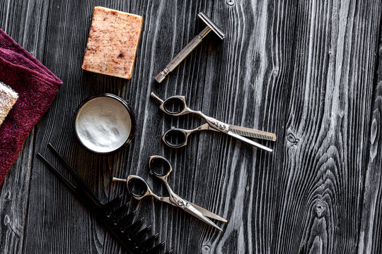 Tools for cutting beard barbershop top view on wooden background