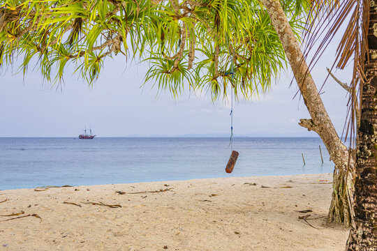 The beach scene with gazebo on the beach under palm tree