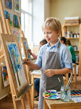 little boy painting