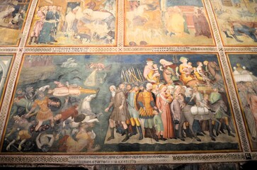 Obraz premium San Gimignano, Italy 03.04.2020: Bartolo di Fredi, Crossing of the Red Sea and Pharaoh with his drowned army