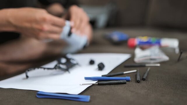 DIY Repair of Game Controller Using Small Tools at Home Workspace