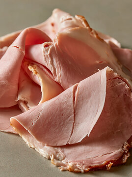 Ham sliced ham deli meat cold cut pork cooked meat protein lunch sandwich gourmet closeup fresh food ingredient slice dinner snack appetizer cuisine butcher pink tender juicy macro meat texture