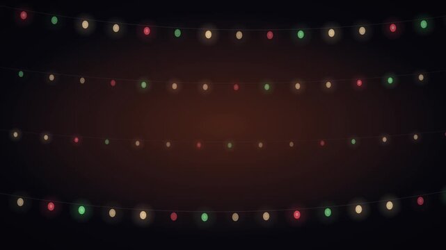 Festive string lights in red green and gold illuminate a dark background creating a warm and inviting atmosphere