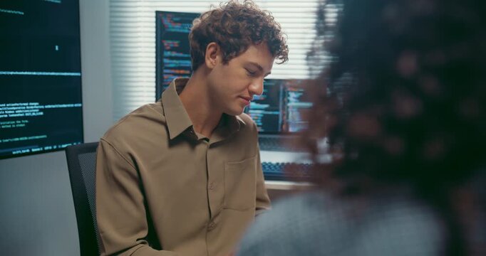Diverse team developer uses tablet discuss AI coding and project strategy at office. Artificial intelligence software debugging, Cybersecurity database server, Machine learning app meeting concept.