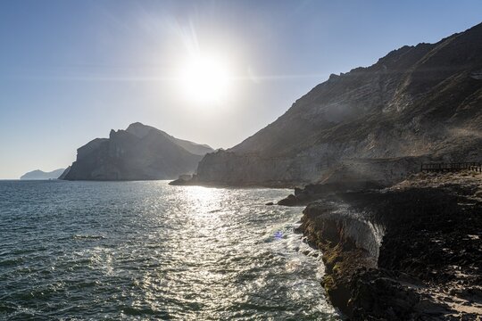 Backlight of the rugged cliffs north of Mughsail beach, Salalah, Oman