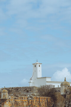 Historic Fortaleza de Peniche under a serene blue sky in Portugal.