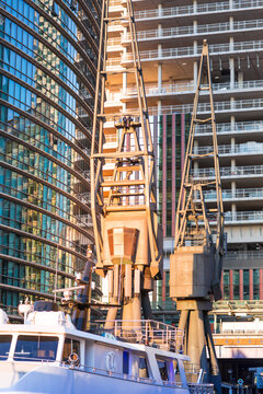 London, Building contraction site in Canary Wharf at sunset