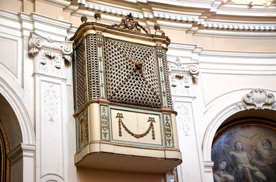 Ragusa Ibla, Sicily 01.03.2020: Enclosure grilles positioned high up on the walls of the Church of San Giuseppe in Ragusa Ibla.