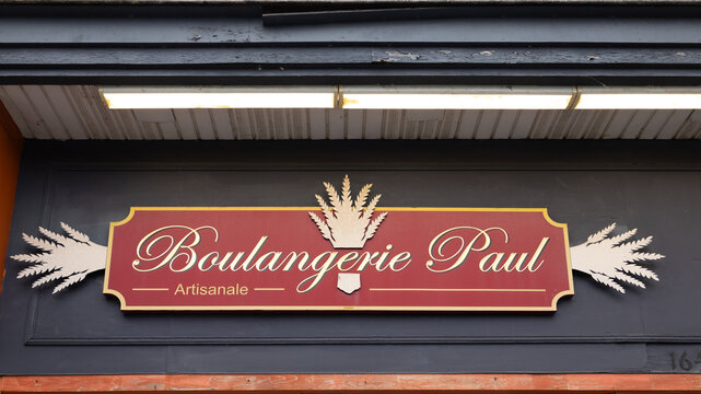 
Quebec City, Qu&eacute;bec, Canada, June 27, 2026 -  Low angle view of the red Boulangerie Paul sign for the artisan bakery located at 1646 chemin St-Louis in the Sillery sector