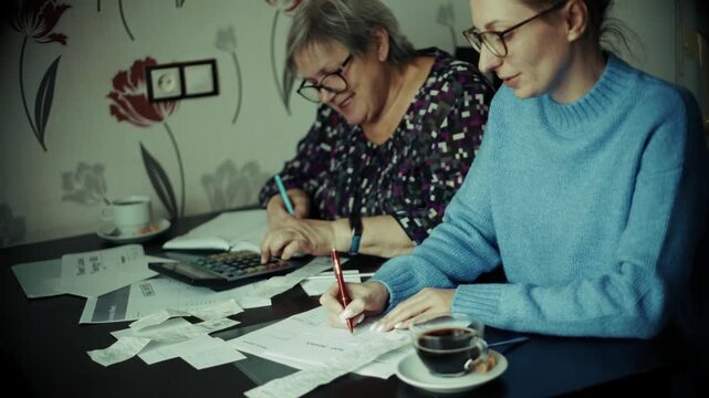 Family Calculating Expenses Bills Checking Receipts. Financial Budget Planning