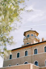 Obraz premium Historic Tuscan villa with octagonal tower and arched windows