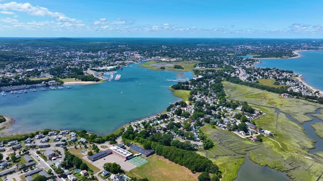 Quincy coast aerial view including Town River Bay, Adams Shore, with Boston modern city skyline in the background, city of Quincy, Massachusetts MA, USA. 