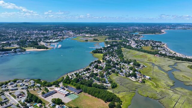 Quincy coast aerial view including Town River Bay, Adams Shore, with Boston modern city skyline in the background, city of Quincy, Massachusetts MA, USA. 