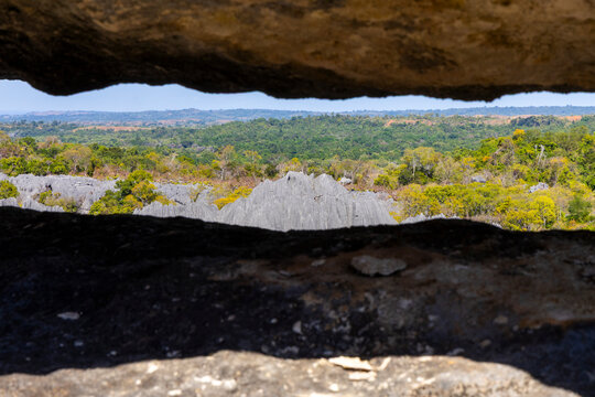 Tsingy rock frame reveals a distant peak, Grand Tsingy, Madagascar