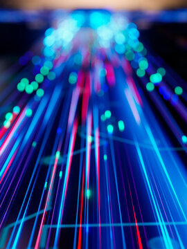 Abstract digital background with glowing blue and red light streaks and data network lines