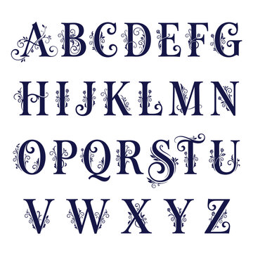 A decorative alphabet with ornate swirls and flourishes in a deep blue hue. Each letter from A to Z is elegantly designed, suggesting a classic or vintage style