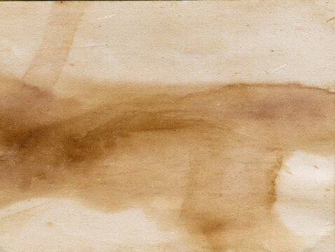 Old stained paper with brown water damage
