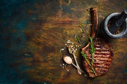 Juicy steak on the bone. Premium Tomahawk steak. Top view.