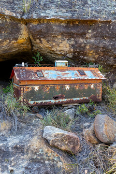 Decorated tomb coffin at a burial cave entrance, Isalo, Madagascar