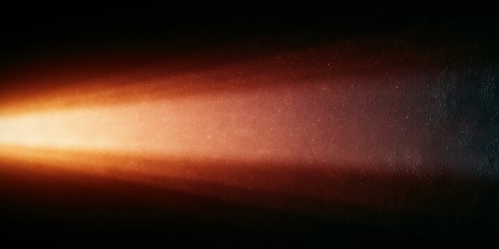 Orange light beam in dark space
