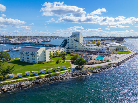 Goat Island aerial view including Goat Island Marina and Newport Harbor Island Resort with Claiborne Pell Newport Bridge at the back in Narragansett Bay, Newport, Rhode Island RI, USA. 