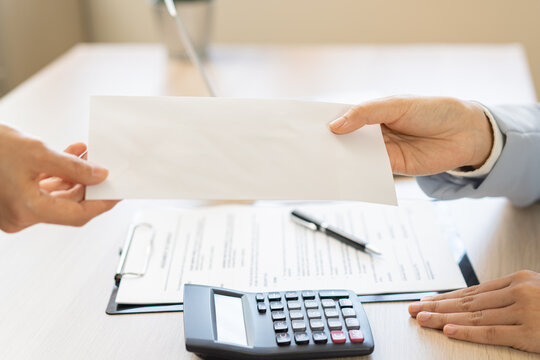 Good job, asian manager business giving financial reward in an envelope, business letter extra salary to company employee, woman worker office hand received premium bonus, getting cheque from her boss
