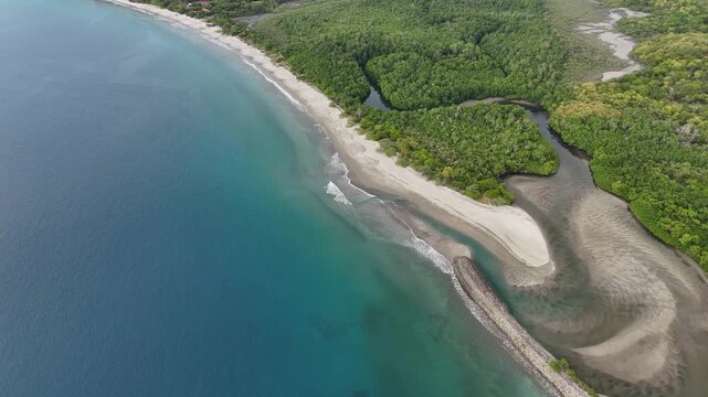 Aerial view of Playa Cabuyal coastline and turquoise waters in Guanacaste, Costa Rica