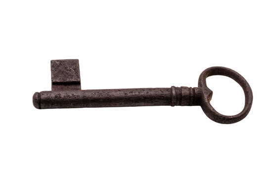 Ancient key rests on stark white background