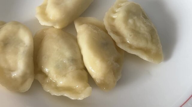 Vareniki stuffed dumplings ravioli serving size natural ingredients healthy eating, wholesome tasty dish, tasty snack fresh, gourmet, rustic food background on the table top view copy space