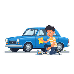 Fototapeta premium Young boy polishing blue car with cloth in bright outdoor setting 