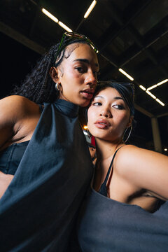 Two Friends Posing at Night