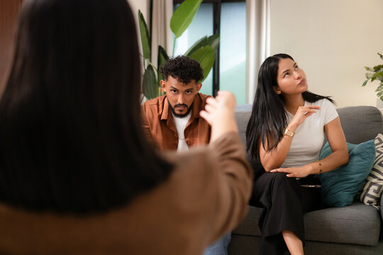 Young couple receiving counseling during a therapy session