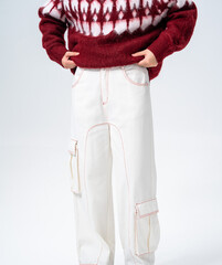Winter fashion men's outfit: Fleece knit cardigan paired with white wide-leg work pants © jeson