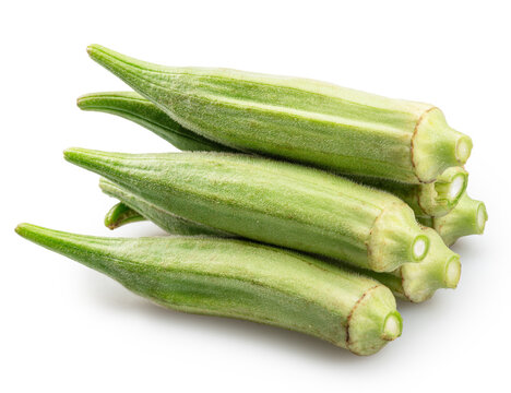  Pile of fresh green raw okra pods for healthy vegetarian cookin