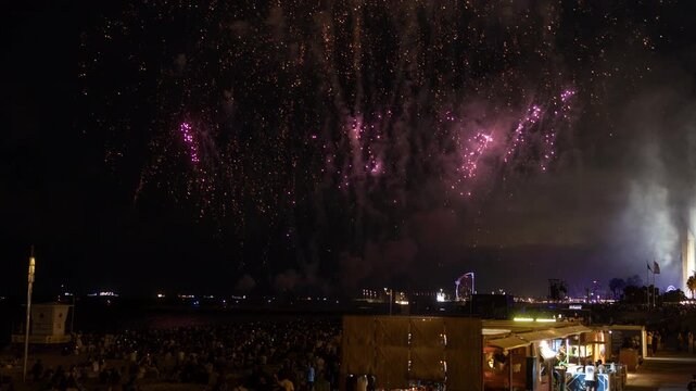 Amazing fireworks display over the coast of barcelona