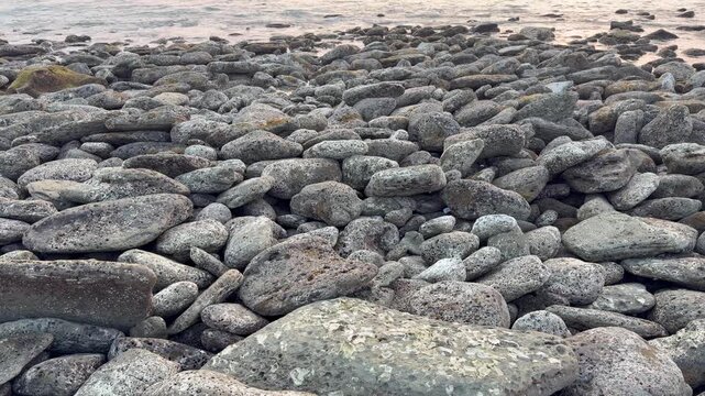 Tilt Up from Coral Rocks to Sunset over the Sea at Saint Martin&rsquo;s Island, Bangladesh