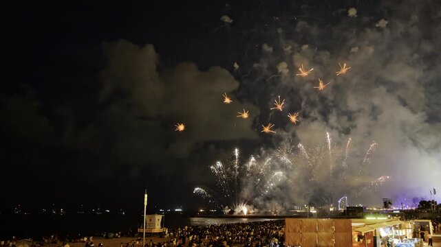 Amazing fireworks display over the coast of barcelona