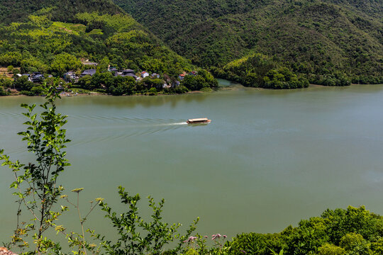 Boat on River by Forested Hillside Village in Tonglu, Zhejiang, China