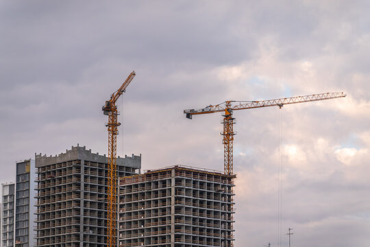 Tower crane at a construction site against the sky