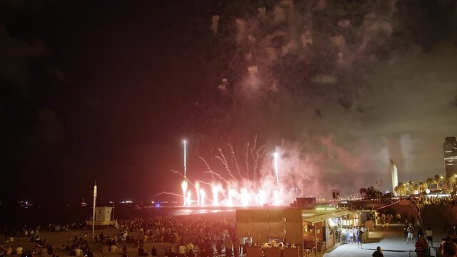 Amazing fireworks display over the coast of barcelona