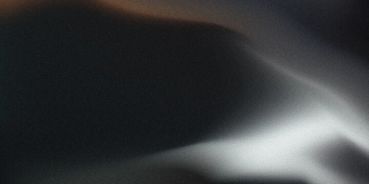 Abstract dark smoky background with dramatic white light beam, soft gray mist and subtle warm glow creating a cinematic atmospheric backdrop with spacious copy space for modern design