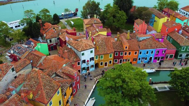 Aerial view of the colorful houses and canals of Burano island in Venice, Veneto, Italy.