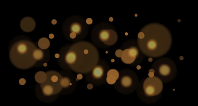 Soft out-of-focus light orbs float at the top of the dark frame. The bokeh circles vary in warm golden tones with different sizes and translucency.