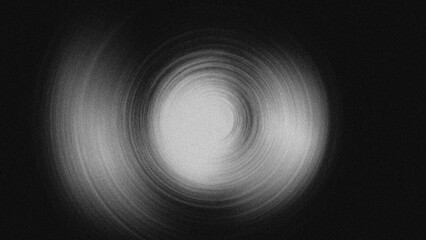 Fototapeta premium A striking monochrome abstract illustration featuring a hypnotic spiral shape. The grainy black-and-white texture with a dynamic spin blur effect makes it perfect as a modern digital wallpaper.