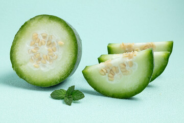Sliced Green Melon with Mint Leaves © HoangNgoc