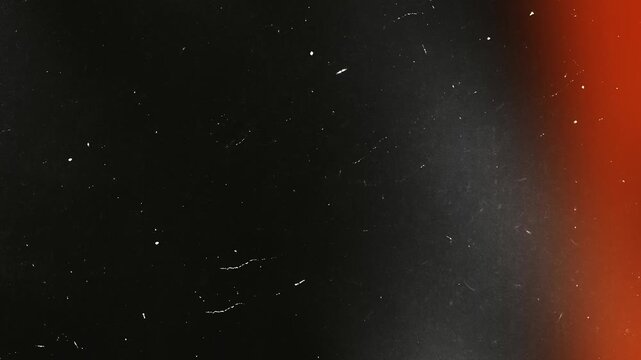 Animated light leak overlay with film grain, dust, Noise, Grunge scratches and vintage cinematic Retro texture. Abstract 4K motion background loop for video editing, filmmaking and creative overlays.