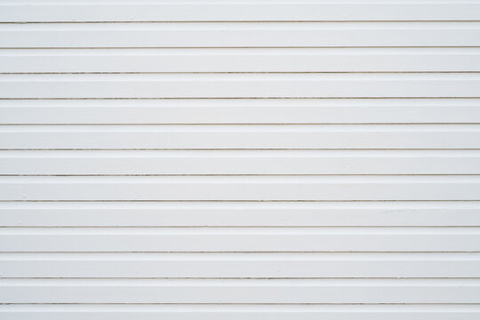 White painted wooden boards with clean repeating horizontal lines